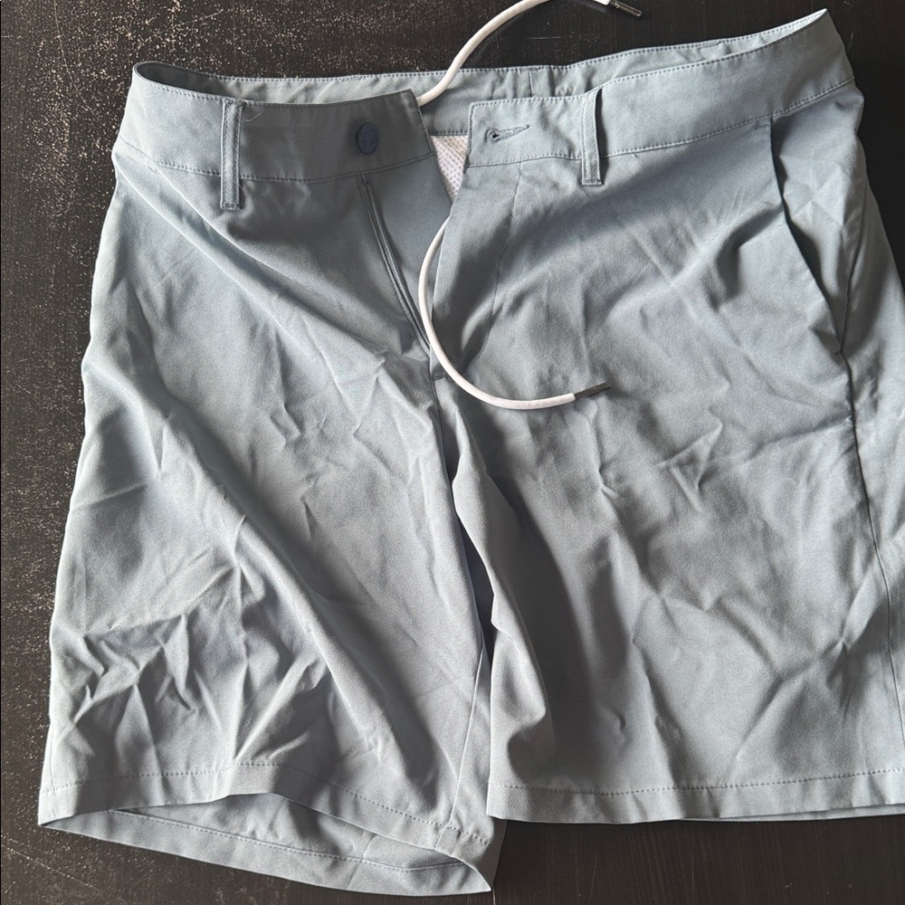 The Normal Brand Hybrid short in steel blue. Size 32. 8” inseam